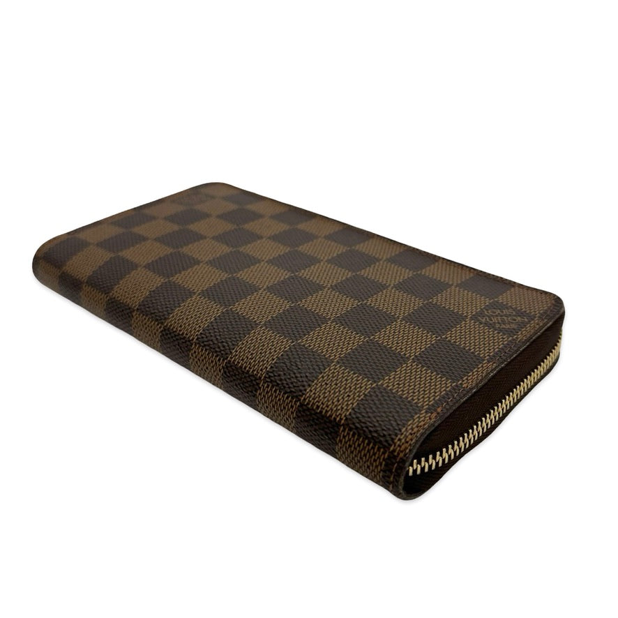 LOUIS VUITTON: Damier Ebene Zippy Wallet