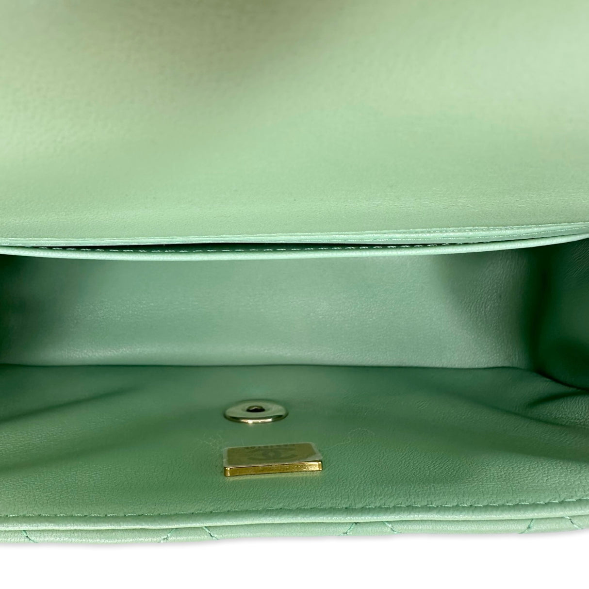 CHANEL: Quilted Lambskin Mini Top Handle Flap bag