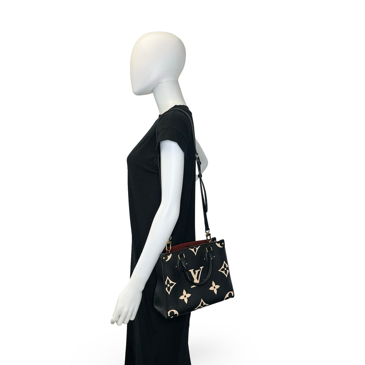 LOUIS VUITTON: Monogram Empreinte Bicolor Onthego PM