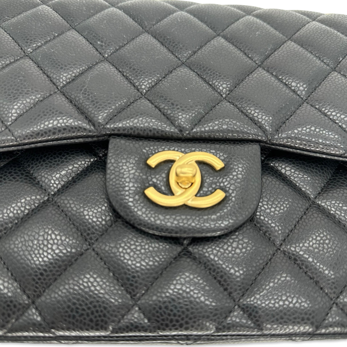 CHANEL: Quilted Caviar Jumbo Classic Double Flap