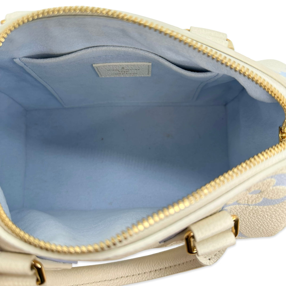 LOUIS VUITTON: Monogram Empreinte Speedy Bandouliere 20