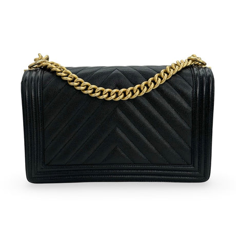 CHANEL: Chevron Quilted Caviar New Medium Boy Bag