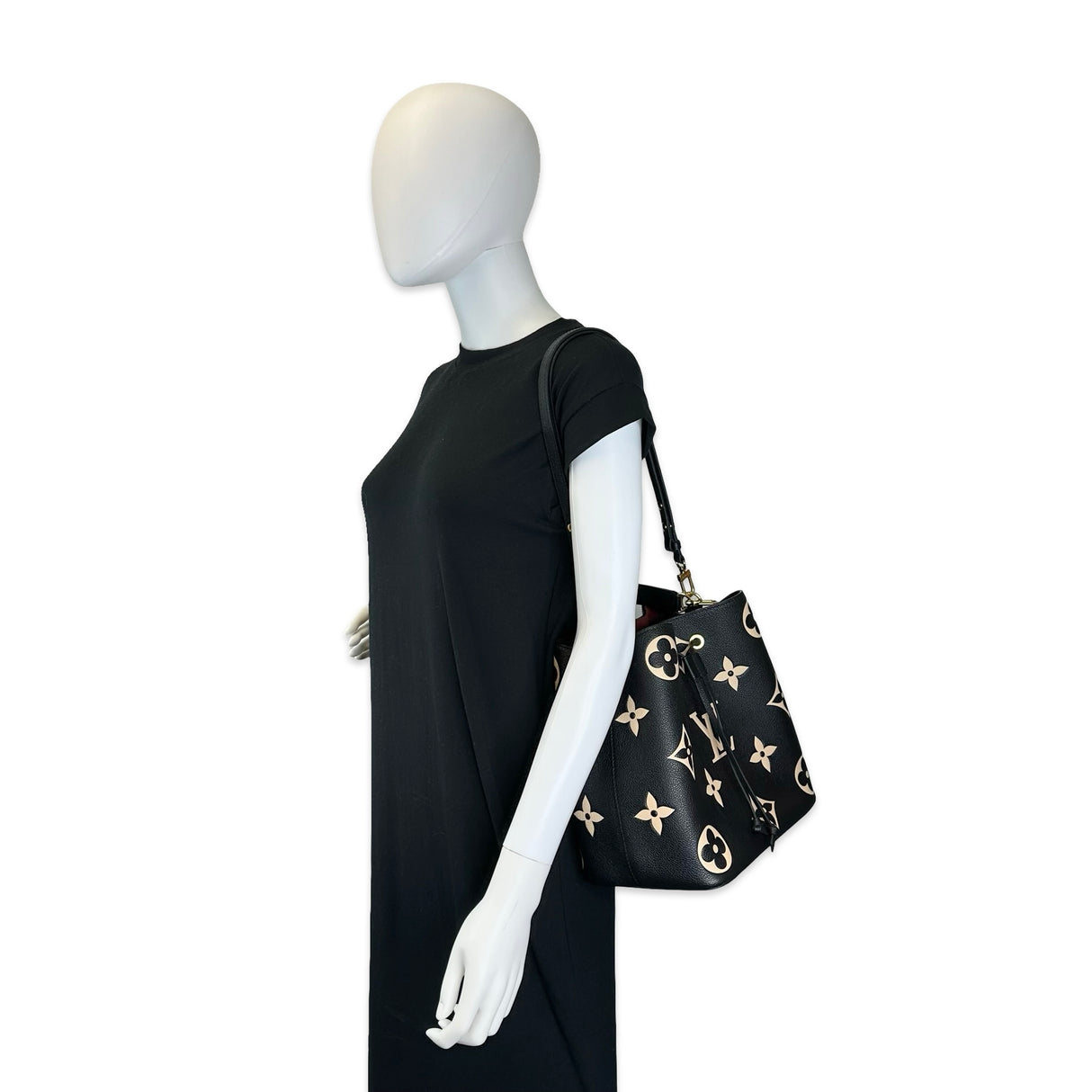 LOUIS VUITTON: Monogram Empreinte Bicolor NeoNoe MM