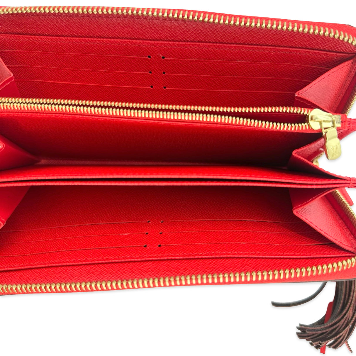 LOUIS VUITTON: Monogram Pompom Zippy Wallet