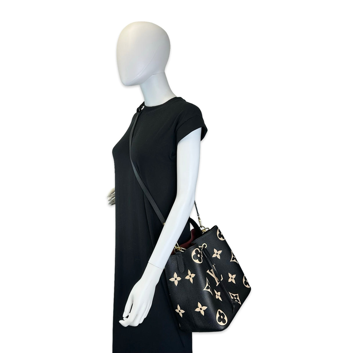 LOUIS VUITTON: Monogram Empreinte Bicolor NeoNoe MM