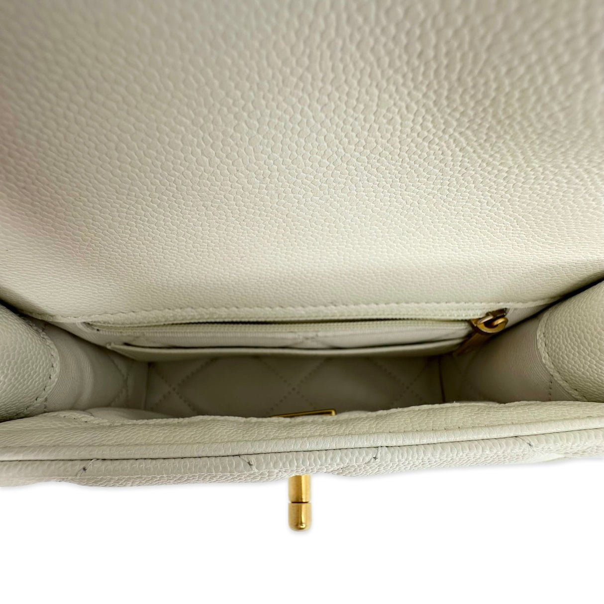 CHANEL: Quilted Caviar Small Chain Flap Bag