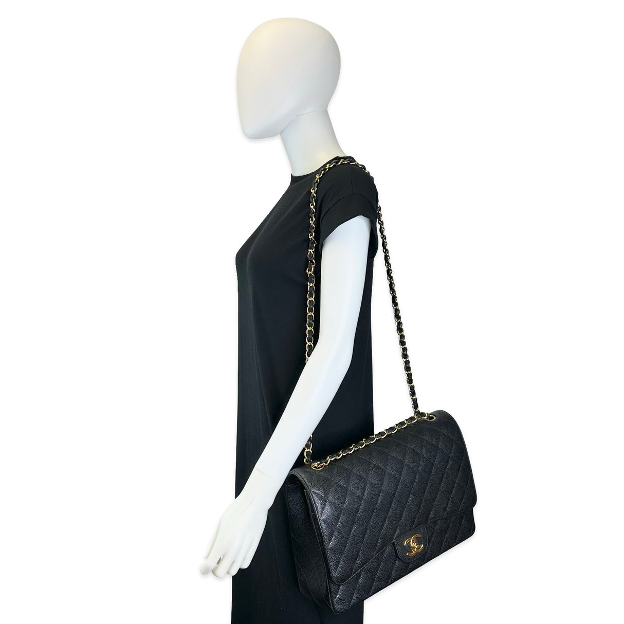CHANEL: Quilted Caviar Maxi Classic Double Flap