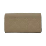 LOUIS VUITTON: Monogram Empreinte Sarah Wallet