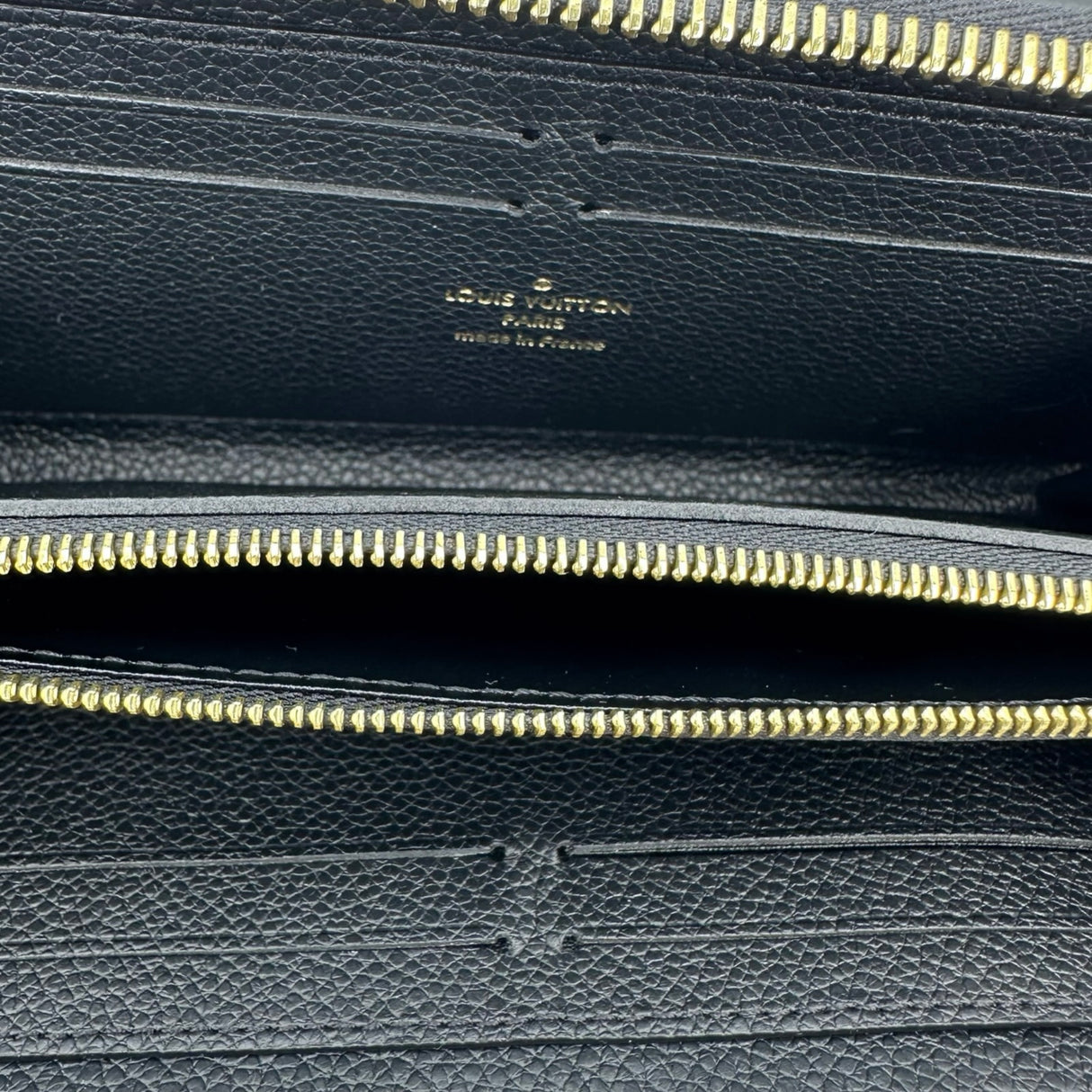 LOUIS VUITTON: Monogram Empreinte Clemence Wallet