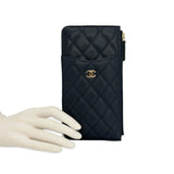 CHANEL: Quilted Caviar Phone Zip Card Case