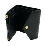 LOUIS VUITTON: Monogram Empreinte Victorine Wallet