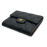 CHANEL: Quilted Caviar Small Classic Flap Wallet