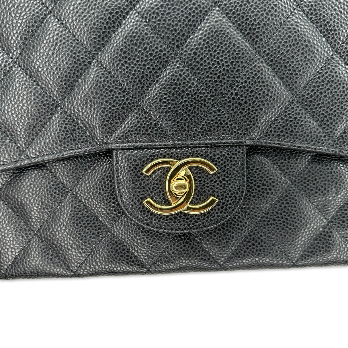 CHANEL: Quilted Caviar Maxi Classic Double Flap
