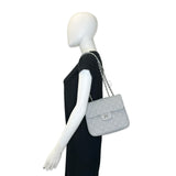 CHANEL: Quilted Caviar Medium Urban Companion Single Flap
