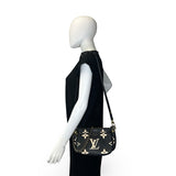 LOUIS VUITTON: Monogram Empreinte Bicolor Multi Pochette Accessoires