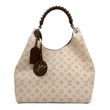LOUIS VUITTON: Mahina Carmel Hobo Bag