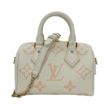 LOUIS VUITTON: Bicolor Monogram Empreinte Speedy Bandouliere 20