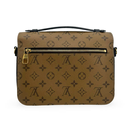 LOUIS VUITTON: Monogram Reverse Pochette Metis