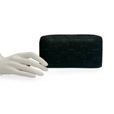 LOUIS VUITTON: Monogram Empreinte Zippy Wallet