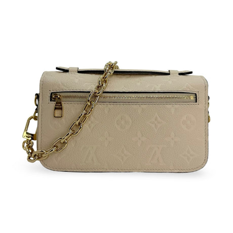 LOUIS VUITTON: Monogram Empreinte Pochette Metis East West