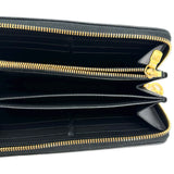 Monogram Embossed Lambskin Coussin Zippy Wallet