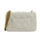 CHANEL: Quilted Caviar Sweetheart Mini Flap Bag