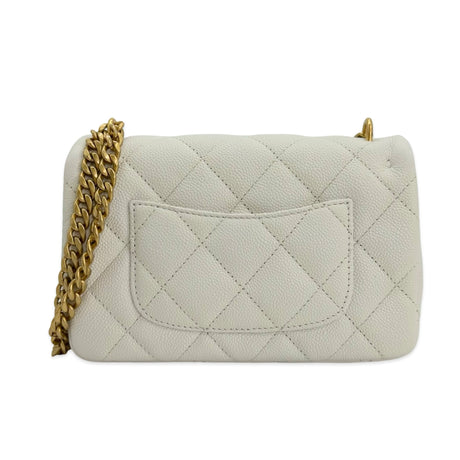 CHANEL: Quilted Caviar Sweetheart Mini Flap Bag