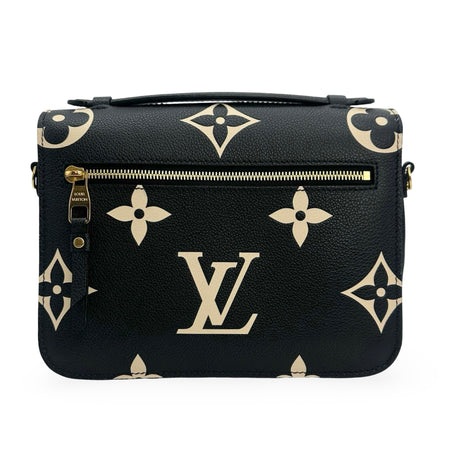 LOUIS VUITTON: Monogram Empreinte Bicolor Pochette Metis