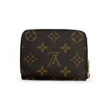 LOUIS VUITTON: Monogram Animation Zippy Coin Purse
