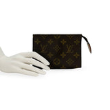 LOUIS VUITTON: Monogram Toiletry 15