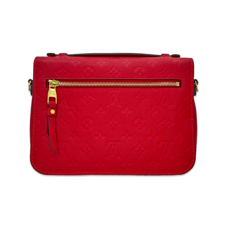 LOUIS VUITTON: Monogram Empreinte Pochette Metis