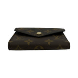 LOUIS VUITTON: Monogram Victorine Wallet