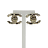 CHANEL: CC Turnlock Stud Earrings