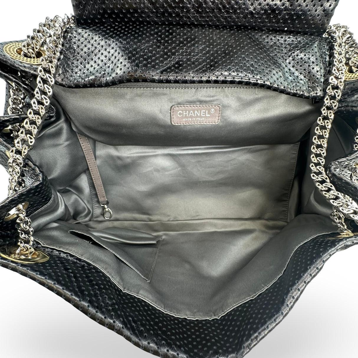 CHANEL: Perforated Calfskin Drill Accordion Flap Bag