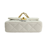 CHANEL: Quilted Caviar Sweetheart Mini Flap Bag