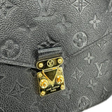 LOUIS VUITTON: Monogram Empreinte Pochette Metis