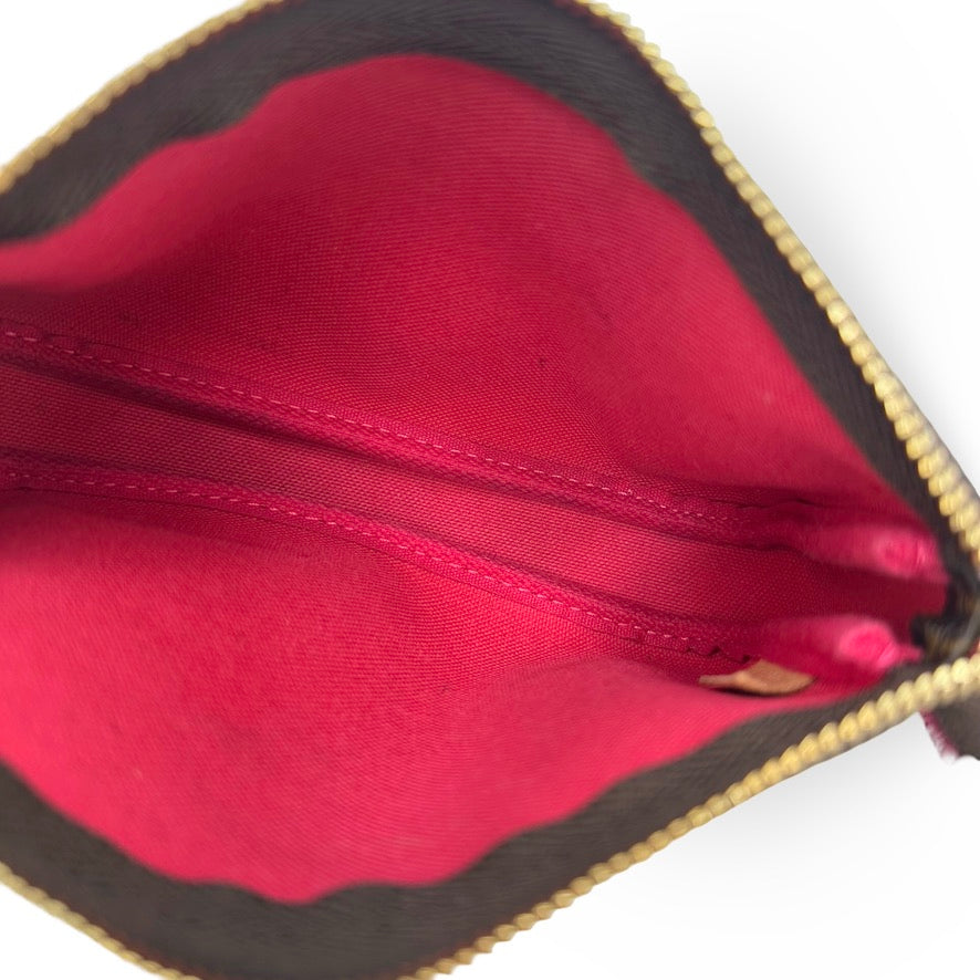 LOUIS VUITTON: Monogram Animation Mini Pochette Accessoires