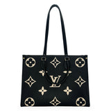 LOUIS VUITTON: Bicolor Monogram Empreinte Onthego MM