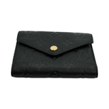 LOUIS VUITTON: Monogram Empreinte Victorine Wallet