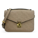 LOUIS VUITTON: Monogram Empreinte Pochette Metis