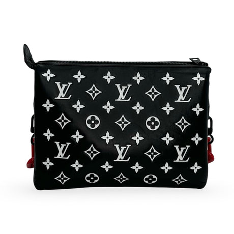 LOUIS VUITTON: Monogram Embossed Lambskin Coussin PM