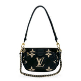 LOUIS VUITTON: Monogram Empreinte Bicolor Multi Pochette Accessoires