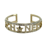 CHANEL: Crystal Star Cuff Bracelet