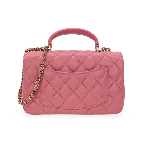 CHANEL: Quilted Lambskin Mini Top Handle Flap Bag