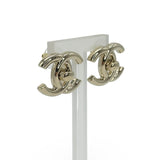 CHANEL: CC Turnlock Stud Earrings