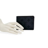 LOUIS VUITTON: Monogram Eclipse Reverse Slender Wallet