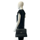 CHANEL: Quilted Caviar Medium Lizard Coco Top Handle Flap Bag