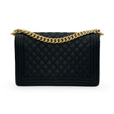 CHANEL: Quilted Caviar Medium Boy Bag