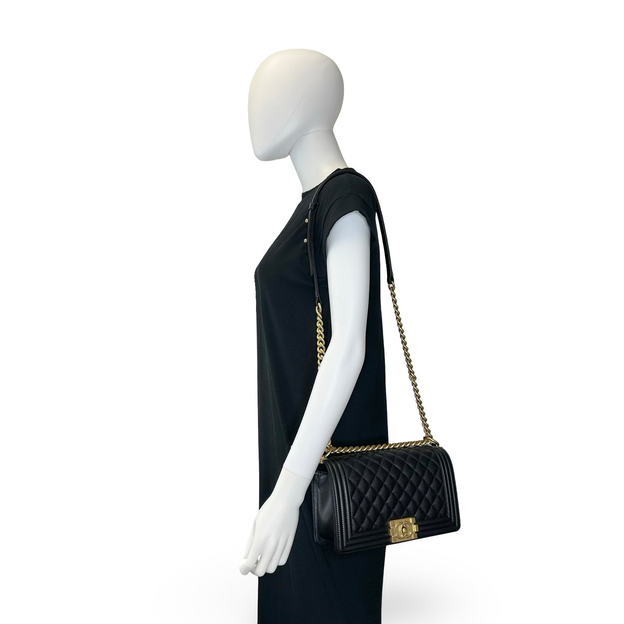 CHANEL: Quilted Caviar Old Medium Boy Bag