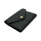 LOUIS VUITTON: Monogram Empreinte Victorine Wallet